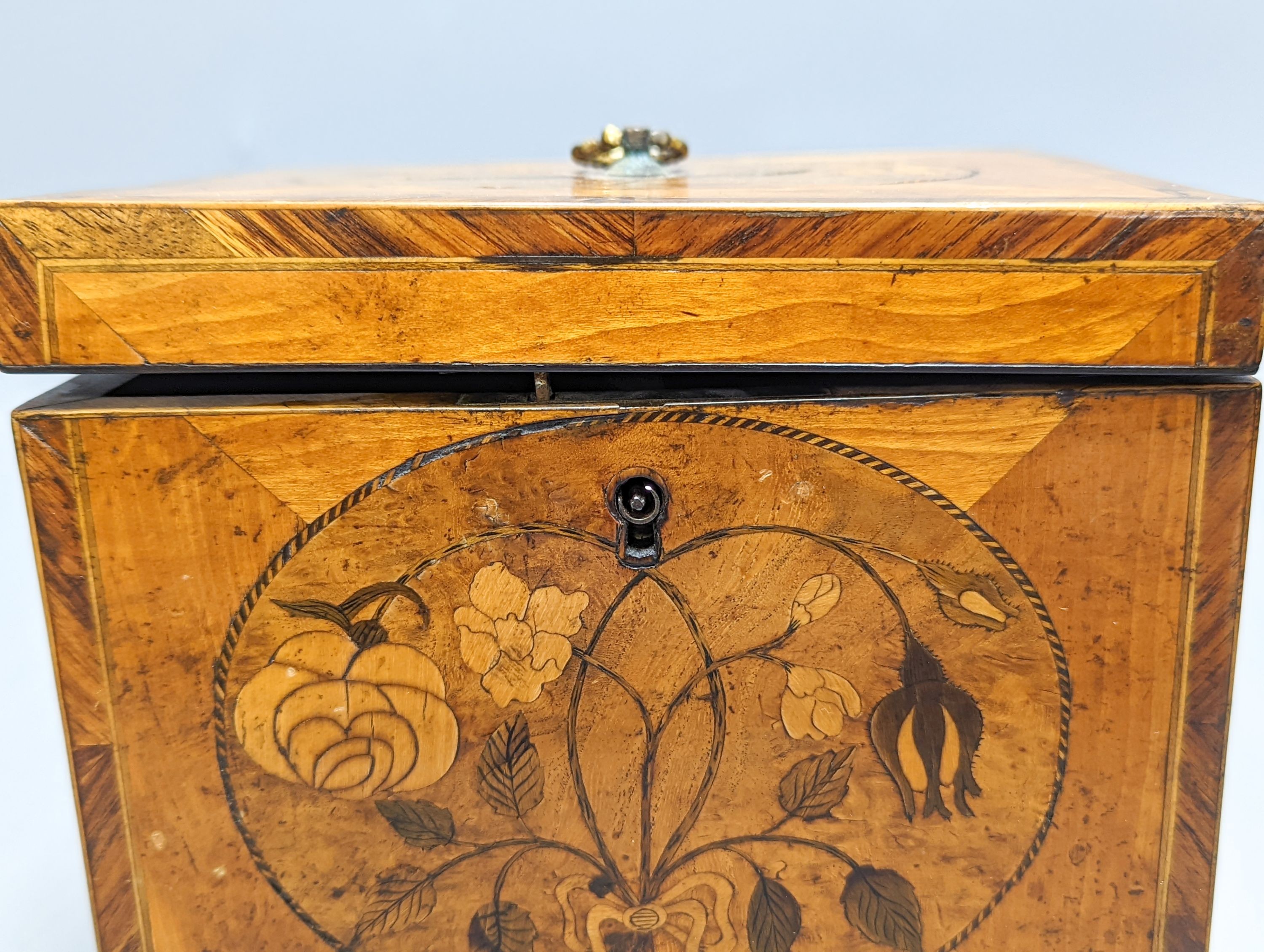 A George III sycamore and floral marquetry tea caddy, 17cm